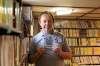 Local filmmaker Jon Ted Wynne shows off a copy of his film, Standing on Guard, which features Prince Philip. (Mike Sudoma / Winnipeg Free Press)