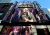 People walk past the Brass Rail strip club in Toronto on Friday, August 14, 2020. A Toronto strip club where as many as 550 people may have been exposed to COVID-19 last week was not following public health guidelines, officials said Friday. THE CANADIAN PRESS/Nathan Denette