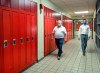 Ontario Premier Doug Ford, left, and Education Minister Stephen Lecce walk the hallway before making an announcement regarding the governments plan for a safe reopening of schools in the fall due to the COVID-19 pandemic at Father Leo J Austin Catholic Secondary School in Whitby, Ont., on Thursday, July 30, 2020. THE CANADIAN PRESS/Nathan Denette