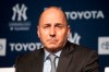 FILE - In this Dec. 18, 2019 file photo, New York Yankees general manager Brian Cashman attends a news conference in New York. Cashman had suspected that the Houston Astros had been breaking rules against electronic sign stealing long before Commissioner Rob Manfred released his report in January that resulted in three big league managers losing their jobs. 