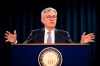 FILE - In this Jan. 29, 2020 file photo Federal Reserve Chair Jerome Powell speaks during a news conference following the Federal Open Market Committee meeting in Washington. The Federal Reserve believes that downside risks to the U.S. economy have lessened with the easing of trade tensions and better prospects for global growth. But officials note a concern that possible spillovers from a deadly virus in China represent a new threat. (AP Photo/Manuel Balce Ceneta, File)