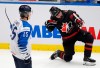 FILE - In this Saturday, Jan. 4, 2020, file photo, Finland's Lenni Killinen, left, skates past as Canada's Jamie Drysdale, right, celebrates after scoring his sides third goal during the U20 Ice Hockey Worlds semifinal match in Ostrava, Czech Republic. Drysdale is a prospect in the upcoming NHL Draft. (AP Photo/Petr David Josek, File)