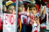 FILE - In this Oct. 14, 2019, file photo, New Jersey Devils fans watch the warm ups before the start of an NHL hockey game against the Florida Panthers, in Newark, N.J. Many NHL issues are similar to those facing North America’s other major professional leagues, such as when fans will be allowed to attend games. Others are more distinct to hockey, such as the effect the drop of the Canadian dollar will have on a league with seven of its 31 teams based north of the border. (AP Photo/Mary Altaffer, File)