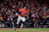 FILE - In this Oct. 30, 2019, file photo, Houston Astros' Carlos Correa reacts to his RBI single during the fifth inning of Game 7 of the baseball World Series against the Washington Nationals in Houston. The last time these teams played the Nationals were celebrating their World Series title in Houston. Since then the Astros have become the league's villains, with a sign-stealing scandal tarnishing their reputation and casting a shadow on their 2017 title. (AP Photo/David J. Phillip, File)