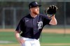 FILE - In this Feb. 15, 2020, file photo, Detroit Tigers' Spencer Turnbull takes part in a drill during a spring training baseball workout in Lakeland, Fla. Christin Stewart homered in the top of the 10th inning to lift Detroit to a win in its season opener last year. A few days later, Spencer Turnbull took the mound for the Tigers as the starting pitcher for their first home game. Those are moments each player can look back on with pride, but both enter 2020 with a lot still to prove. (AP Photo/Frank Franklin II, File)