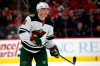 FILE - In this Saturday, Dec. 7, 2019, file photo, Minnesota Wild's Ryan Donato (6) eyes the puck during the third period of an NHL hockey game against the Carolina Hurricanes, in Raleigh, N.C. The Wild traded forward Ryan Donato to the San Jose Sharks on Monday, Oct. 5, 2020, for a third-round pick in the 2021 draft, continuing their makeover under general manager Bill Guerin. (AP Photo/Karl B DeBlaker, File)