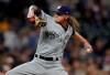 FILE - In this Saturday, Sept. 28, 2019 file photo,Milwaukee Brewers relief pitcher Josh Hader (71) in the ninth inning of a baseball game in Denver. All-Star closer Josh Hader went to a hearing with Milwaukee on Thursday, Feb. 13, 2020 after just making the eligibility cutoff with 2 years, 115 days of major league service. Hader asked for a raise from $687,600 to $6.4 million, and the Brewers argued for $4.1 million. (AP Photo/David Zalubowski, File)