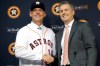 FILE - In this Sept. 29, 2014, file photo, Houston Astros general manager Jeff Luhnow, right, and A.J. Hinch pose after Hinch is introduced as the new manager of the baseball club in Houston. Hinch and Luhnow were fired Monday, Jan. 13, 2020, after being suspended for their roles in the team's extensive sign-stealing scheme from 2017. (AP Photo/Pat Sullivan, File)
