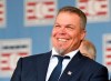 FILE - In this July 29, 2018, file photo, National Baseball Hall of Fame inductee Chipper Jones reacts during an induction ceremony at the Clark Sports Center in Cooperstown, N.Y. Chipper Jones has joined the ESPN lineup. The former Atlanta Braves star will work as a major league analyst, primarily on weeknight and holiday games. He'll debut on opening day when San Francisco plays at Dodger Stadium on March 26.(AP Photo/Hans Pennink, File)