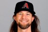 FILE - This is a 2020 photo photo showing Mike Leake of the Arizona Diamondbacks baseball team. Diamondbacks right-hander Mike Leake has opted out of the 2020 season due to concerns about the coronavirus. Diamondbacks general manager Mike Hazen did not elaborate on Leake’s decision during a Zoom call, but the pitcher’s agent issued a statement saying he made a personal decision not to play during the pandemic. (AP Photo/Darron Cummings, File)