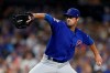 FILE - In this Sept. 11, 2019, file photo, Chicago Cubs pitcher Cole Hamels works against a San Diego Padres batter during the fourth inning of a baseball game in San Diego. The Atlanta Braves need new veteran leadership for a rotation that has lost Julio Teheran and Dallas Keuchel. Left-hander Cole Hamels is eager to fill the void as pitchers and catchers report to spring training on Wednesday, Feb. 12, 2020. (AP Photo/Gregory Bull, File)