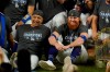 FILE - In this Oct. 27, 2020 file photo, Los Angeles Dodgers manager Dave Roberts and third baseman Justin Turner pose for a group picture after the Dodgers defeated the Tampa Bay Rays to win the baseball World Series in Arlington, Texas. Roberts isn't sure Turner or former All-Star pitcher David Price will play with the Los Angeles Dodgers in 2021.(AP Photo/Eric Gay, File)
