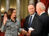 FILE - In this Tuesday, Jan. 3, 2017 file photo, Vice President Joe Biden administers the Senate oath of office to Sen. Kamala Harris, D-Calif., as her husband, Douglas Emhoff, holds the Bible during a a mock swearing in ceremony in the Old Senate Chamber on Capitol Hill in Washington as the 115th Congress begins. President-elect Biden and Vice President-elect Harris are set to take their oaths of office on Wednesday, Jan., 20, 2021, using Bibles that are laden with personal meaning, writing new chapters in a long-running American tradition – and one that appears nowhere in the law. (AP Photo/Kevin Wolf)