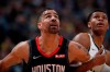 FILE - In a Sunday, Jan. 26, 2020 file photo, Houston Rockets forward Thabo Sefolosha (18), left, and Denver Nuggets guard PJ Dozier (35) in the second half of an NBA basketball game, in Denver. Time has not healed all wounds for Sefolosha, the NBA veteran who says he was attacked by a group of New York Police Department officers in April 2015 while they were arresting him outside a nightclub in the city’s Chelsea neighborhood. (AP Photo/David Zalubowski, File)