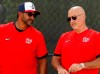 FILE - In this Feb. 17, 2020, file photo, Washington Nationals manager Dave Martinez, left, talks with general manager Mike Rizzo during spring training baseball practice in West Palm Beach, Fla. Armed with a new multiyear contract, Rizzo says his top priority is working on a new deal for Martinez. The team has a club option for Martinez for 2021, but Rizzo says he prefers a long-term deal for the manager. (AP Photo/Jeff Roberson, File)