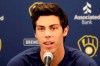 FILE - In this March 6, 2020, file photo, Milwaukee Brewers' Christian Yelich speaks after the Brewers announced his multi-year contract extension at the team's spring training facility in Phoenix. Yelich acknowledges he benefited from fortunate timing in how he handled his contract negotiations. The Brewers held the March 6 news conference to announce that the 2018 NL MVP had agreed to a nine-year, $215 million contract. Spring training was halted due less than a week later due to the coronavirus. (AP Photo/Matt York, File)