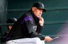 FILE - In this Aug. 27, 2019, file photo, Colorado Rockies manager Bud Black watches during the first inning of the team's baseball game against the Boston Red Sox in Denver. Black said in a conference call Thursday, March 19, that he would be open to the idea of doubleheaders. Opening day has been pushed back from March 26 to mid-May at the earliest, and both sides are committed to playing as many games as possible. (AP Photo/David Zalubowski, File)