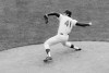FILE - In this April 20, 1967, file photo, New York Mets' Tom Seaver pitches against the Chicago Cubs in a baseball game at Shea Stadium in New York. Seaver, the galvanizing leader of the Miracle Mets 1969 championship team and a pitcher who personified the rise of expansion teams during an era of radical change for baseball, has died. He was 75. The Hall of Fame said Wednesday night, Sept. 2, 2020, that Seaver died on Aug. 31 from complications of Lewy body dementia and COVID-19. (AP Photo, File)