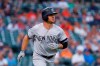 FILE - In this Sept. 10, 2019, file photo, New York Yankees' Brett Gardner rounds first base after hitting a solo home run in the second inning of the team's baseball game against the Detroit Tigers in Detroit. The Yankees plan to plan to exercise two option years on reliever Zack Britton worth $27 million and to decline options on outfielder Gardner and pitcher J.A. Happ. The decisions were disclosed by a person familiar with the team’s decisions who spoke on the condition of anonymity Thursday because they had not been announced. (AP Photo/Paul Sancya, File)