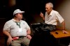 In this image released by Warner Bros. Pictures, director Clint Eastwood speaks with actor Paul Walter Hauser as they work during the filming of the movie 