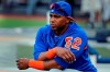 FILE - In this July 20, 2018, file photo, New York Mets' Yoenis Cespedes stretches before the team's baseball game against the New York Yankees in New York. It‚Äôs been a bizarre offseason for the Mets ‚Äî even by their standards. They dumped two different managers, cut Cespedes‚Äô salary, and ownership took a swing at selling a controlling share of the franchise before the proposed deal collapsed. (AP Photo/Julie Jacobson, File)