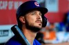 FILE - In this Aug. 10, 2019, file photo, Chicago Cubs' Kris Bryant (17) sits in the dugout during a baseball game against the Cincinnati Reds in Cincinnati. The All-Star third baseman has lost his service-time grievance against the Cubs, two people with direct knowledge of the situation told The Associated Press on Wednesday, Jan. 29, 2020. (AP Photo/Aaron Doster, FIle)