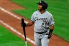 FILE - In this Sept. 18, 2020, file photo, Chicago White Sox' Edwin Encarnacion reacts during a baseball game against the Cincinnati Reds in Cincinnati. About 50 players would be eligible for free agency if their options are declined by Sunday, among them the White Sox designated hitter Edwin Encarnacion. (AP Photo/Aaron Doster, File)
