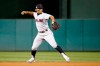 FILE - In this Sept. 27, 2019, file photo, Cleveland Indians shortstop Francisco Lindor relays to first after fielding a ground ball during a baseball game against the Washington Nationals in Washington. Lindor's unsettled future with Cleveland hangs over the team like a darkening storm cloud. And when he and the Indians arrive at training camp later this month in Goodyear, Ariz., the 27-year-old's situation will likely be a daily topic until there is some resolution.(AP Photo/Patrick Semansky, File)