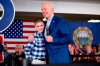 FILE - Then Democratic presidential candidate former Vice President Joe Biden hugs Brayden Harrington at a campaign stop in Gilford, N.H. on Feb. 10, 2020. Harrington, who will be part of a primetime inaugural special, has a book coming out this summer. His picture story “Brayden Speaks Up” will be released Aug. 10. (AP Photo/Andrew Harnik, File)