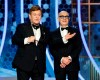 This image released by NBC shows presenters Elton John, left, and Bernie Taupin at the 77th Annual Golden Globe Awards at the Beverly Hilton Hotel in Beverly Hills, Calif., on Sunday, Jan. 5, 2020. (Paul Drinkwater/NBC via AP)