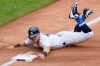 New York Yankees' Mike Tauchman advances to third on a missed pick-off attempt at first by New York Mets starting pitcher Robert Gsellman in the fourth inning of a baseball game, Saturday, Aug. 29, 2020, in New York. (AP Photo/John Minchillo)