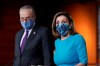 FILE - In this Thursday, Nov. 12, 2020 file photo, Speaker of the House Nancy Pelosi, D-Calif., and Senate Minority Leader Chuck Schumer, D-N.Y., meet with reporters on Capitol Hill in Washington. Congress is preparing to convene for a new session with lawmakers sworn into office during a tumultuous period. Democrat Nancy Pelosi is set Sunday, Jan. 3, 2021 to be reelected as House speaker by her party, which retains the majority in the House but with the slimmest margin in 20 years after a November election wipeout. (AP Photo/J. Scott Applewhite, File)