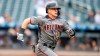 FILE - In this Sept. 12, 2019 file photo Arizona Diamondbacks' Nick Ahmed runs to first during the sixth inning of a baseball game against the New York Mets in New York. The Diamondbacks have agreed to a $32.5 million, four-year deal with Ahmed. The 29-year-old Ahmed avoids his final year of salary arbitration with the deal, which keeps him with the team through 2023. (AP Photo/Mary Altaffer, file)