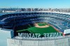 This March 26, 2020 file photo shows an empty Yankee Stadium on opening day due to COVID-19 coronavirus restrictions in the Bronx borough of New York. The Yankees and Mets would train in New York if Major League Baseball and its players try to start the coronavirus-delayed season. New York Gov. Andrew Cuomo made the announcement Saturday, June 20, 2020, and the teams confirmed the decisions. (John Woike/Samara Media via AP)