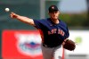 FILE- In this March 3, 2020, file photo, Houston Astros pitcher Jared Hughes throws to a St. Louis Cardinals batter during the third inning of a spring training baseball game in Jupiter, Fla. The sinkerballing reliever and the Mets agreed Tuesday, June 30, 2020, to a $700,000, one-year contract, a deal that amounts to $259,259 in prorated pay over the 60-game season. (AP Photo/Julio Cortez, File)