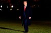 FILE - In this Tuesday, Jan. 5, 2021, file photo, President Donald Trump arrives in the early morning hours at the White House in Washington, after returning from a rally in Dalton, Ga. Trump’s days in office are numbered. But he’s already stopped doing much of his job. (AP Photo/Andrew Harnik, File)