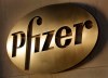 FILE - In this Monday, Nov. 23, 2015, file photo, the Pfizer logo is displayed at world headquarters in New York. On Monday, Nov. 9, 2020, Pfizer said an early peek at its vaccine data suggests the shots may be 90% effective at preventing COVID-19. (AP Photo/Mark Lennihan, File)