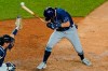 Tampa Bay Rays pinch-hitter Michael Brosseau ducks away from a pitch from New York Yankees reliever Aroldis Chapman during the ninth inning of a baseball game Tuesday, Sept. 1, 2020, at Yankee Stadium in New York, as catcher Kyle Higashioga reaches for the ball. (AP Photo/Kathy Willens)