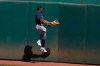 Seattle Mariners center fielder Kyle Lewis cannot catch a two-run double hit by Oakland Athletics' Mark Canha during the seventh inning of a baseball game in Oakland, Calif., Sunday, Sept. 27, 2020. (AP Photo/Jeff Chiu)