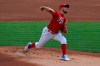 Cincinnati Reds' Trevor Bauer throws in the first inning during a baseball game against the Chicago Cubs in Cincinnati, Saturday, Aug. 29, 2020. (AP Photo/Aaron Doster)