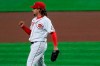 Cincinnati Reds' Luis Castillo reacts to striking out Pittsburgh Pirates' Kevin Newman during the seventh inning of a baseball game in Cincinnati, Wednesday, Sept. 16, 2020. (AP Photo/Aaron Doster)