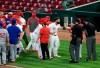 Cincinnati Reds' Jesse Winker argues with umpires as both benches cleared in the fourth inning of the second baseball game of the team's doubleheader against the Chicago Cubs on Saturday, Aug. 29, 2020, in Cincinnati. (Albert Cesare/The Cincinnati Enquirer via AP)