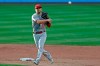 Cincinnati Reds' Kyle Farmer throws out Cleveland Indians' Beau Taylor during the fifth inning of a baseball game baseball game at Progressive Field, Thursday, Aug. 6, 2020, in Cleveland. (AP Photo/David Dermer)