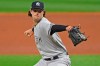 New York Yankees starting pitcher Gerrit Cole (45) in the first inning of Game 1 of an American League wild-card baseball series against the Cleveland Indians, Tuesday, Sept. 29, 2020, in Cleveland. (AP Photo/David Dermer)