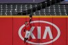 Cleveland Indians' Tyler Naquin leaps for but can't reach a two-run home run hit by New York Yankees' Gary Sanchez during the sixth inning of Game 2 of an American League wild-card baseball series, Wednesday, Sept. 30, 2020, in Cleveland. (AP Photo/David Dermer)