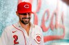 Cincinnati Reds' Nick Castellanos waits for interviews to begin during a news conference announcing his signing with the baseball club, Tuesday, Jan. 28, 2020, in Cincinnati. Castellanos signed a $64 million, four-year deal with the Reds. (AP Photo/John Minchillo)