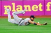 Detroit Tigers' Victor Reyes makes a diving attempt on a single by Cleveland Indians' Greg Allen during the eighth inning of a baseball game, Saturday, Aug. 22, 2020, in Cleveland. (AP Photo/Ron Schwane)