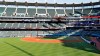 The Cleveland Indians and the Kansas City Royals stand for the national anthem before a baseball game Friday, July 24, 2020, in Cleveland. (AP Photo/Tony Dejak)