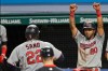 Minnesota Twins' Eddie Rosario (20) celebrates as teammate Miguel Sano (22) scores in the sixth inning of a baseball game against the Cleveland Indians, Monday, Aug. 24, 2020, in Cleveland. Sano hit a two-run home run and Rosario scored on the play. (AP Photo/Tony Dejak)