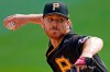 Pittsburgh Pirates starting pitcher Chad Kuhl delivers during the first inning of the team's baseball game against the Cincinnati Reds in Pittsburgh, Sunday, Sept. 6, 2020. (AP Photo/Gene J. Puskar)
